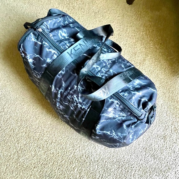 Kendall & Kylie Duffle Bag in Faux Stone Pattern - Picture 1 of 10